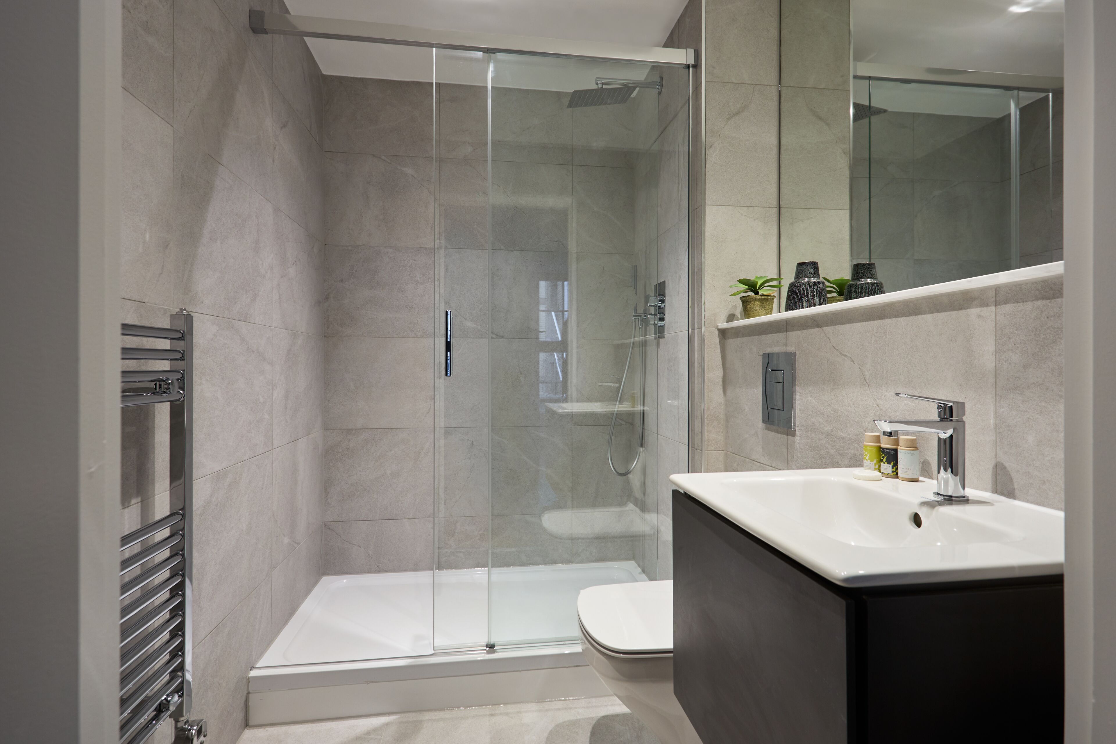 One Bedroom One Bathroom | Bathroom | Eco-friendly toiletries, hair dryer, towels, toilet paper