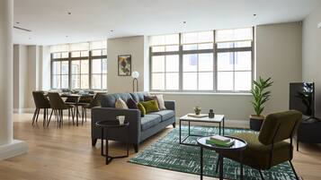 Three Bedroom Two Bathroom | Living area | 40-inch TV with cable channels, Netflix, streaming services