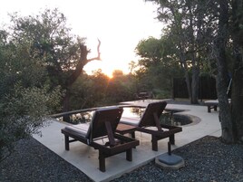 Seasonal outdoor pool, open 6:00 AM to 7:00 PM, sun loungers