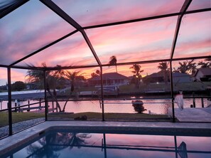 Outdoor pool, a heated pool - Gulf access 3 king beds w/ensuites, bunk bed ping pong table heated pool kayaks (Cape Coral)