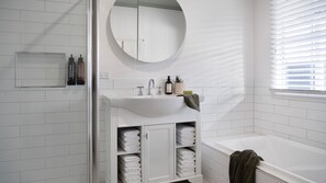 Shower, hair dryer, towels