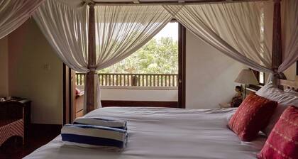 Offering air-conditioned rooms in the Pengosekan district of Ubud, The Pause Inn