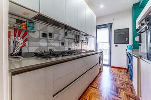 Deluxe Apartment | Private kitchen | Full-size fridge, oven, stovetop, cookware/dishes/utensils - Cozy and Design Rome  (Rome)
