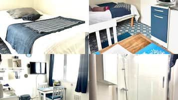 Een bureau, een strijkplank/strijkijzer, wifi, beddengoed