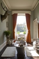 Deluxe Double Room | Bathroom | Hair dryer, towels, soap, shampoo