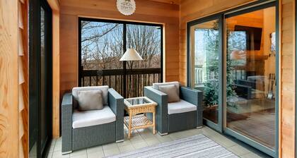 Relax by Torch Lake, just a quick 18-min drive away