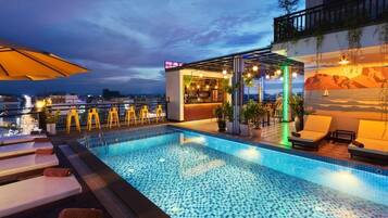 Outdoor pool, pool umbrellas, pool loungers