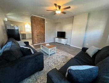 Large family room with 50" Smart TV.