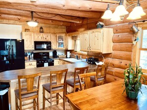 Private kitchen - Cozy Log Cabin with fireplace, pool table, deck, and spacious kitchen!  (Nekoosa)