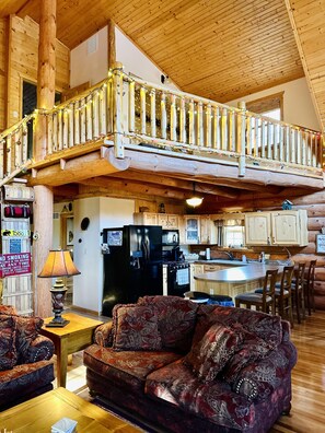 Living area - Cozy Log Cabin with fireplace, pool table, deck, and spacious kitchen!  (Nekoosa)