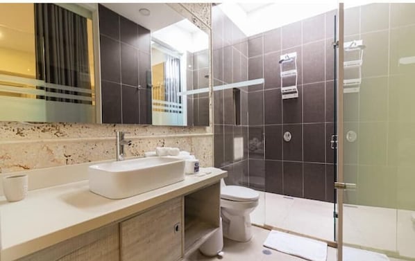 Shower, hair dryer, towels, soap