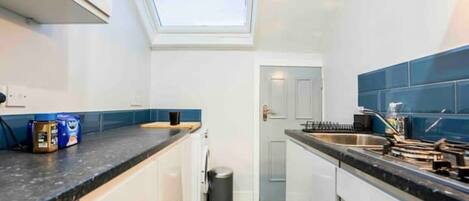 Fridge, microwave, toaster, cookware/dishes/utensils