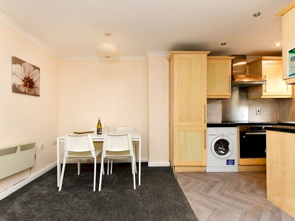 Fridge, oven, cookware/dishes/utensils