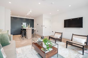 Basic-Apartment, Mehrere Betten | Wohnbereich