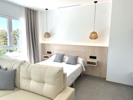 Suite estudio, vistas a la ciudad | Decoración individual, mobiliario individual, wifi gratis y ropa de cama