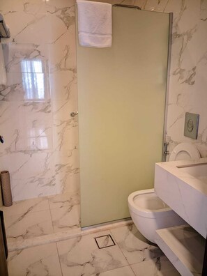 Eco-friendly toiletries, hair dryer, bathrobes, slippers