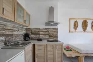 Fridge, coffee/tea maker, electric kettle, toaster
