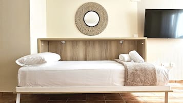 Een strijkplank/strijkijzer, gratis wifi, beddengoed