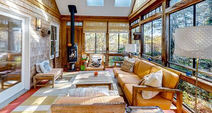Dog-friendly, hilltop home near the beach with hot tub, firepit & gorgeous porch