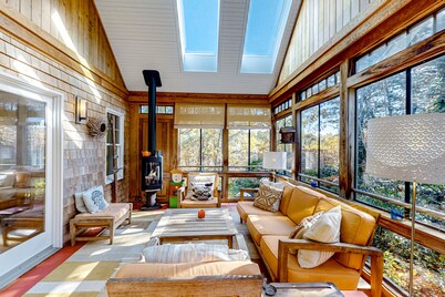 Dog-friendly, hilltop home near the beach with hot tub, firepit & gorgeous porch