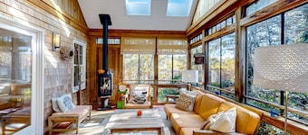 Dog-friendly, hilltop home near the beach with hot tub, firepit & gorgeous porch