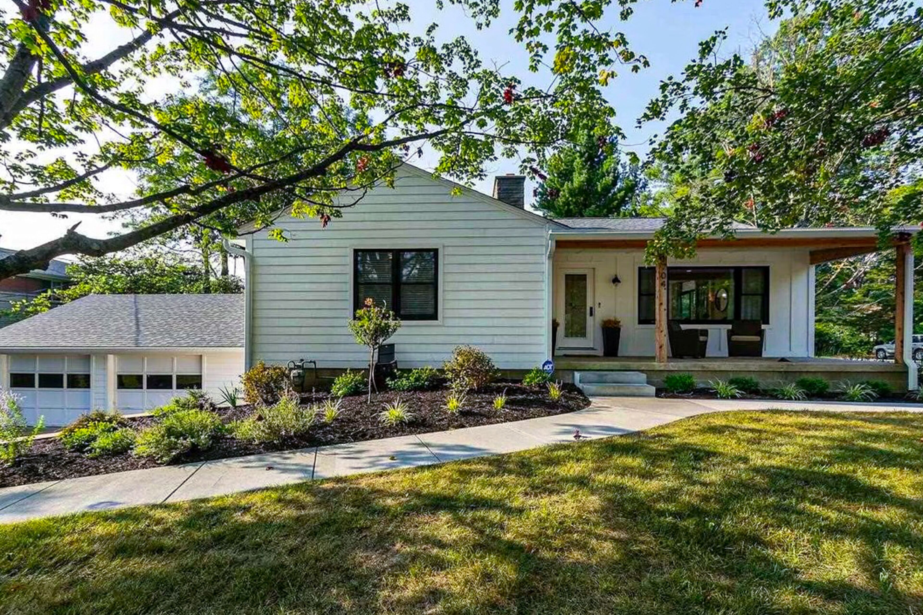 Luxury home close to IU campus with patio, fireplace, central AC, & W/D