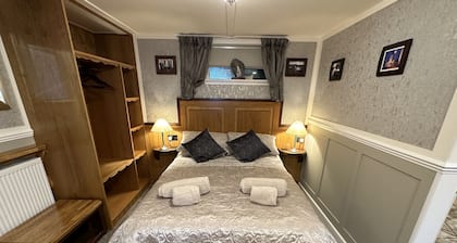This charming retreat offers a cosy and comfortable base for couples