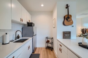 Fridge, microwave, coffee/tea maker, toaster