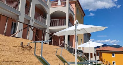 Apartments surrounded by greenery, valley view with livable outdoor areas