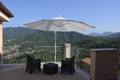 Apartments surrounded by greenery, valley view with livable outdoor areas