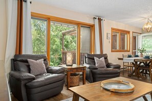 House, Multiple Beds, Patio, Mountain View (2625 Hanover Drive) | Living area | 55-inch flat-screen TV with digital channels, TV, fireplace - Close to Trails, Parks & Open Space! Amazing Yard! (Fort Collins)