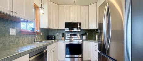 House, Multiple Beds, Patio, Mountain View (2625 Hanover Drive) | Private kitchen | Fridge, microwave, oven, stovetop