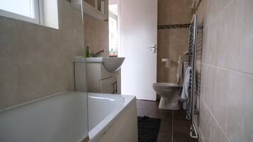 Hair dryer, towels, soap, shampoo