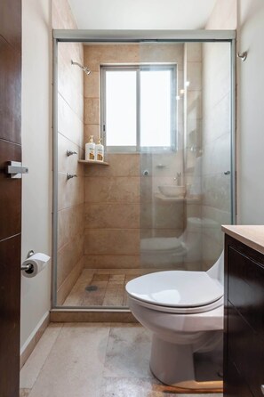 Shower, hair dryer, shampoo