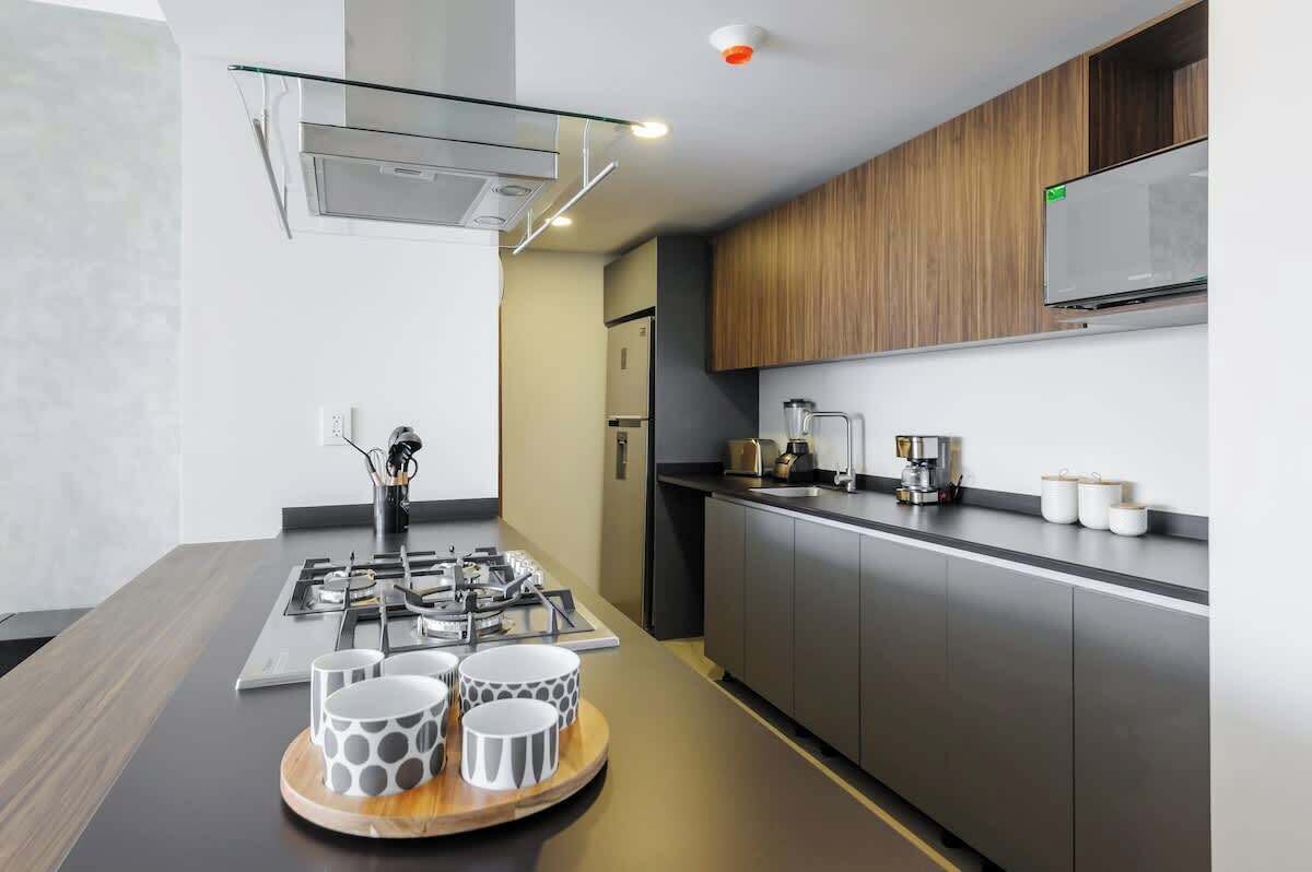 Fridge, microwave, stovetop, coffee/tea maker