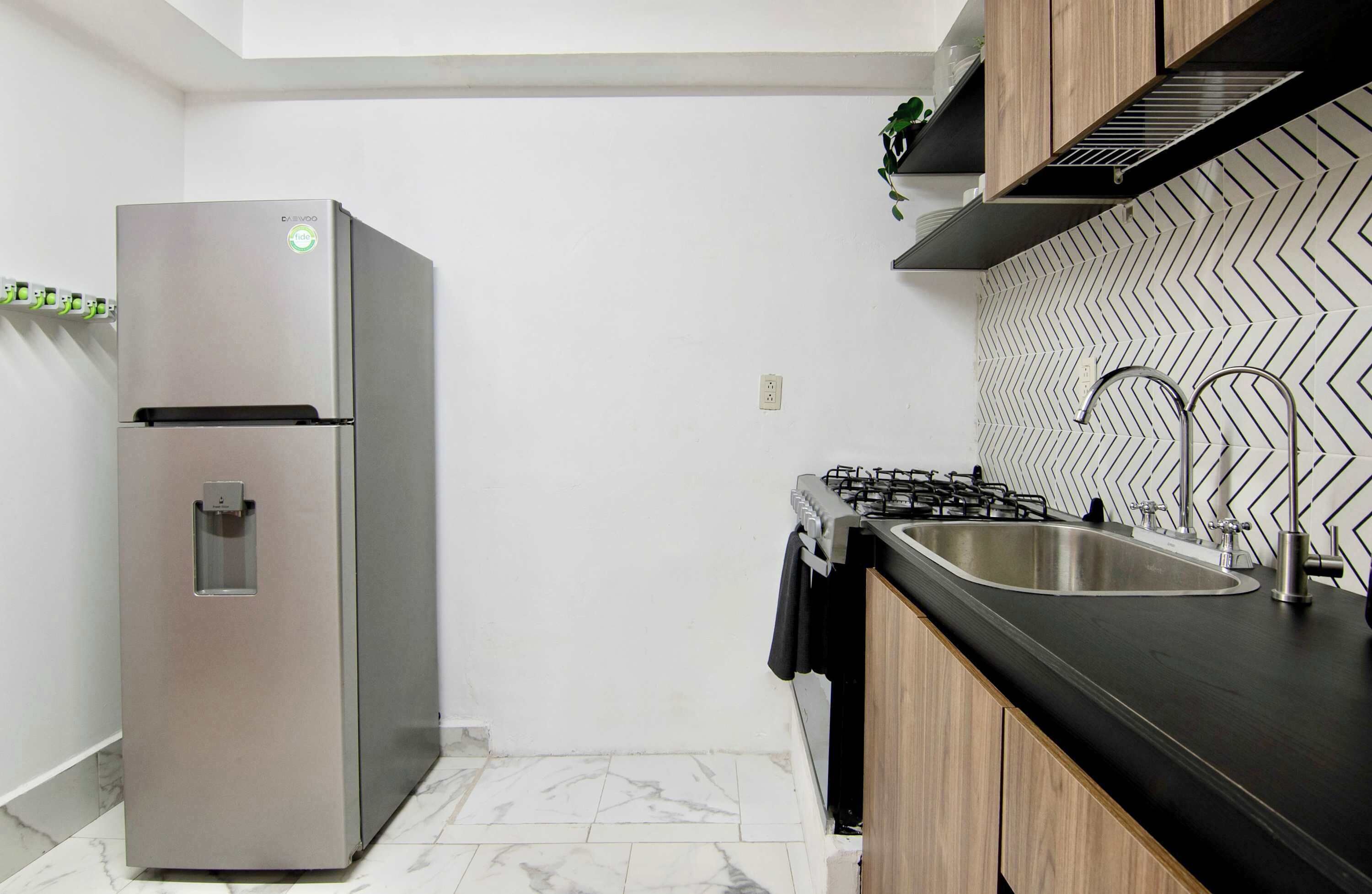 Coffee/tea maker, fridge, microwave, oven