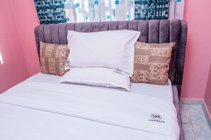 1 bedroom, desk, iron/ironing board, travel crib