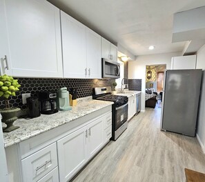 Paper towels - Game room. FULLY fenced. Safe and quiet neighborhood (Cleveland)