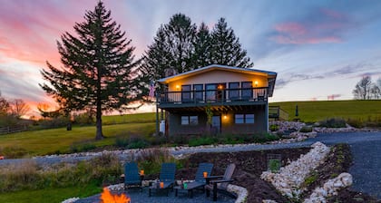 77 in Canaan. Big views. Night skies. Quiet comfort. Dogs, EV, kids13+ welcome.