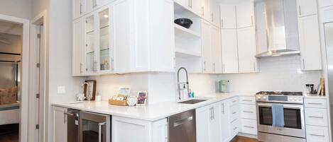 Microwave, coffee/tea maker, toaster, cookware/dishes/utensils