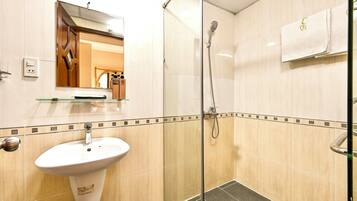 Rainfall showerhead, hair dryer, slippers, towels