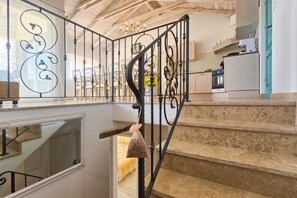 A staircase with ornate metal railings leading to a second floor. - Villa Lapis with private Pool, Buzet, Croatia (Buzet)