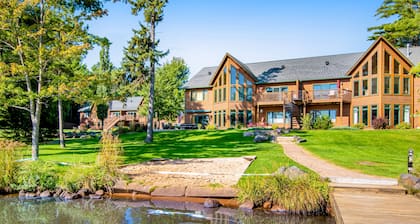 Waterfront condo with scenic balcony, fireplace, streaming, full kitchen, & W/D