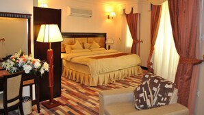 Executive Suite | Desk, laptop workspace, WiFi (free), bed sheets - Capital O 155 Dmas Hotel (Muscat)