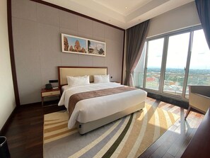 Deluxe Double Room, City View | Premium bedding, minibar, in-room safe, iron/ironing board - V V Hotel Battambang (Battambang)