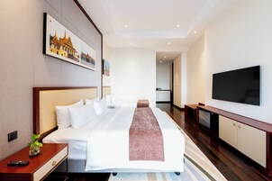 Family Suite, City View | Premium bedding, minibar, in-room safe, iron/ironing board