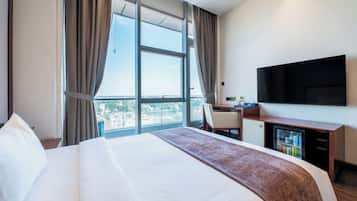 Deluxe Single Room, City View | Premium bedding, minibar, in-room safe, iron/ironing board