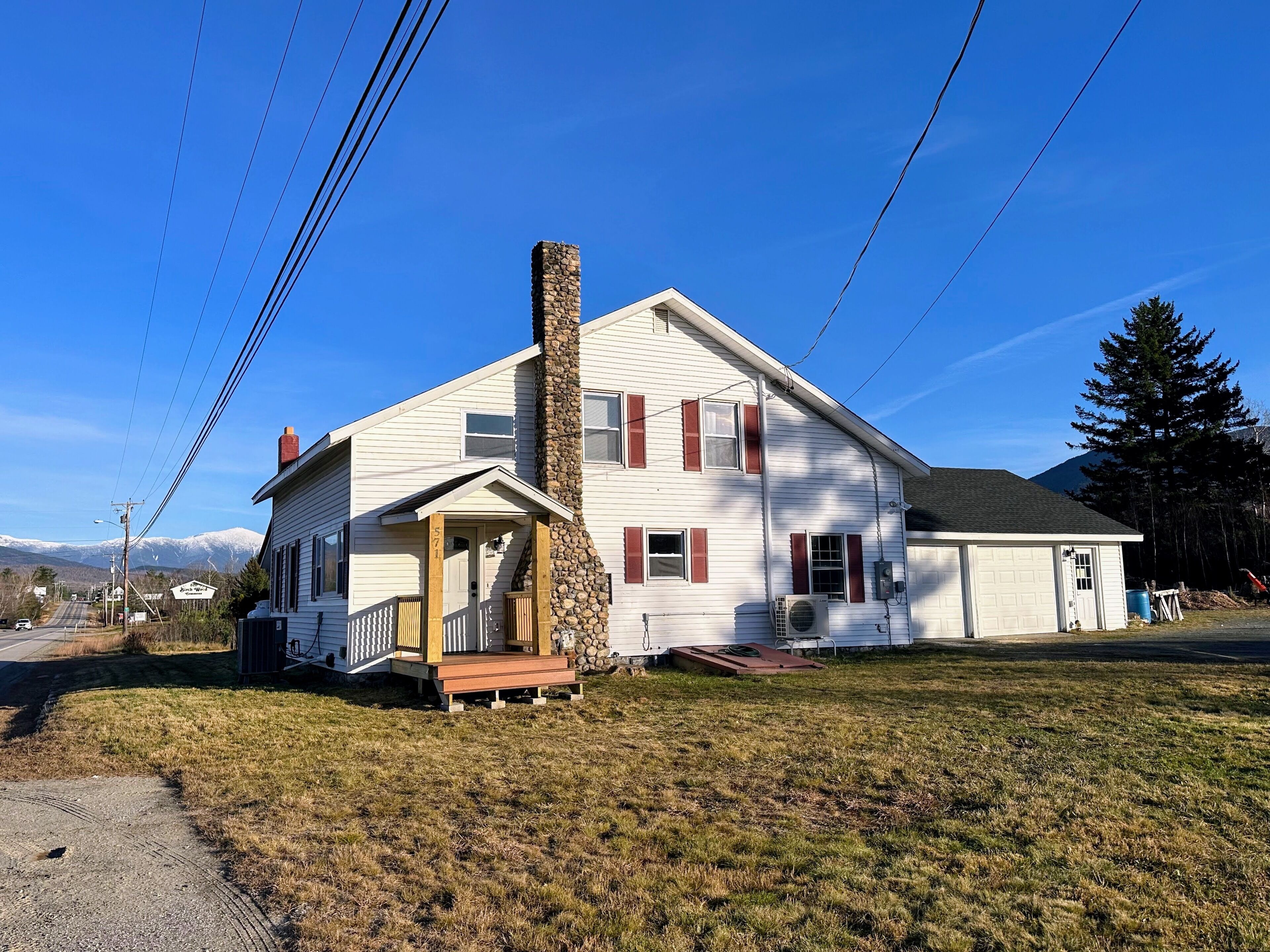 Renovated farmhouse on snowmobile trail with firepit & mountain views, 10 min from Bretton Woods!