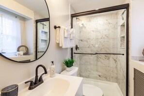 Shower, hair dryer, shampoo