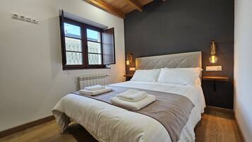 2 dormitorios, tabla de planchar con plancha, wifi gratis y ropa de cama